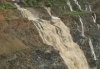 Амурский рудник превратился в водопад: бурлящий паводок залил отработанный карьер