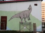 В благовещенском дворе на стене поселился амурозавр: художники расписали трансформаторную будку