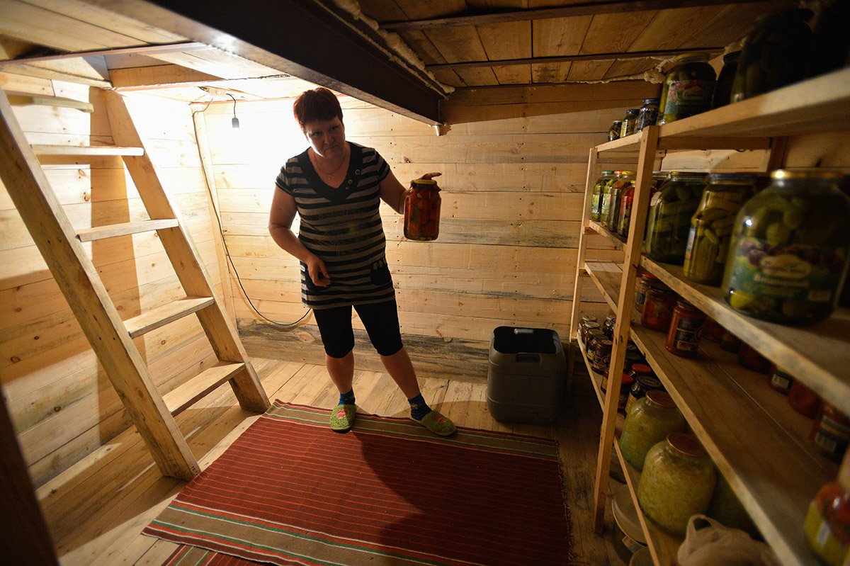 К Ольге Летун в подполье ходят на экскурсию. Фото: Андрей Оглезнев