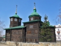 Этодвухпрестольная деревянная церковь, освященная во имя св. Николая Чудотворца и Архангела Михаила.