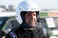 Мастер спорта по автогонкам Михаил Садовничий готовится к очередному скоростному участку.