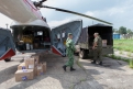 Вертолет также  доставил в районы  гуманитарную  помощь.