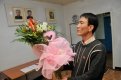 В этот день к портретам лидера КНДР традиционно приносят цветы.
